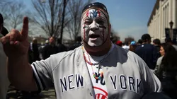 A Yankee fan with a painted face pauses at Yankee Stadium for the Home Opener between the New York Yankees and the Toronto Blue Jays on April 6, 2015.