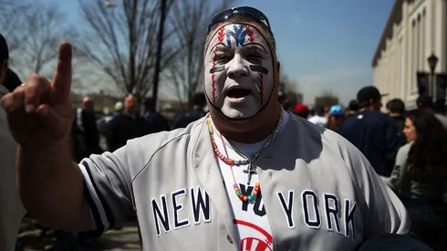 A Yankee fan with a painted face pauses at Yankee Stadium for the Home Opener between the New York Yankees and the Toronto Blue Jays on April 6, 2015.