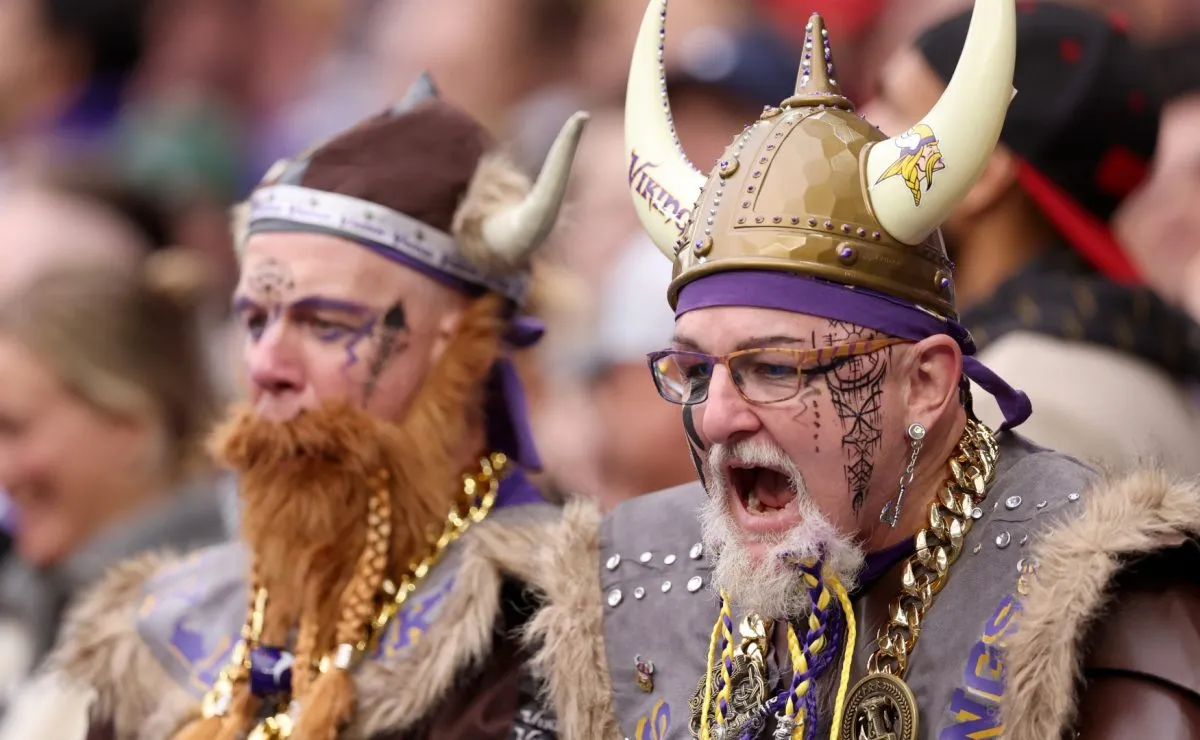 A fan of Minnesota Vikings shows their support, while wearing fancy dress prior to the NFL match between New York Jets and Minnesota Vikings in 2024. (Source: Julian Finney/Getty Images)