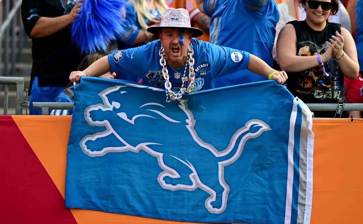 A Detroit Lions fan cheers during the first half against the Tampa Bay Buccaneers in 2023. (Source: Julio Aguilar/Getty Images)