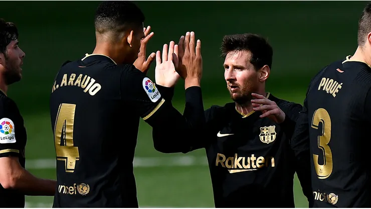 Ronald Araujo and Lionel Messi