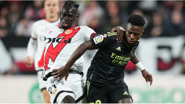 Pathe Ciss of Rayo Vallecano and Vinicius of Real Madrid