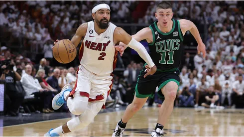 Gabe Vincent #2 of the Miami Heat drives against Payton Pritchard #11 of the Boston Celtics