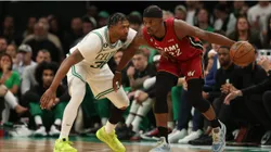 Jimmy Butler #22 of the Miami Heat is guarded by Marcus Smart #36 of the Boston Celtics