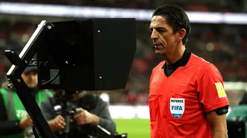 Referee checks the VAR