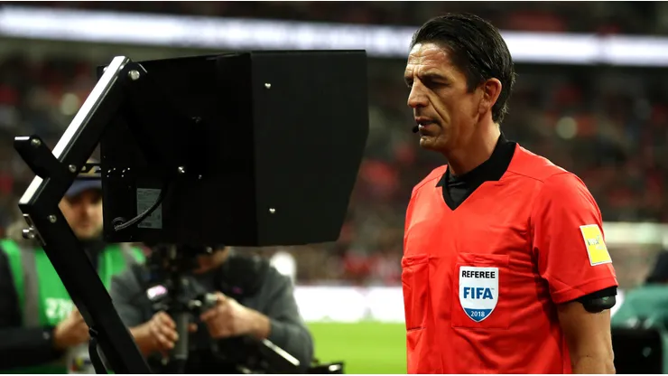 Referee checks the VAR