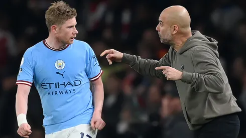 Kevin De Bruyne and Pep Guardiola of Manchester City