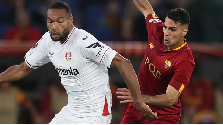 Jonathan Tah of Bayer Leverkusen and Zeki Celik of Roma