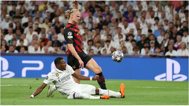 Erling Haaland of Manchester City shot is stopped by David Alaba of Real Madrid