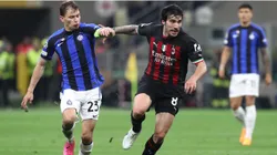 Sandro Tonali (R) of AC Milan is pressured by Nicolo’ Barella (L) of FC Internazionale