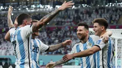 Lionel Messi celebrates with Argentine teammates at Qatar 2022