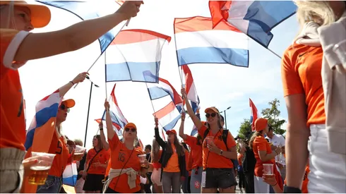 Netherlands fans are seen waving flags