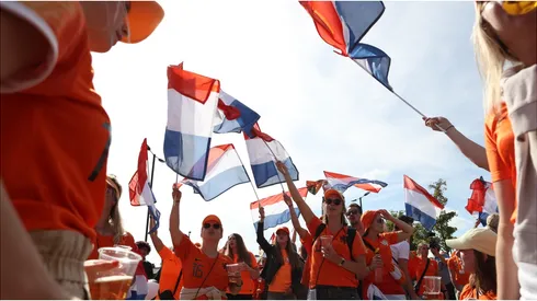 Netherlands fans are seen waving flags