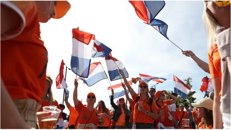 Netherlands fans are seen waving flags