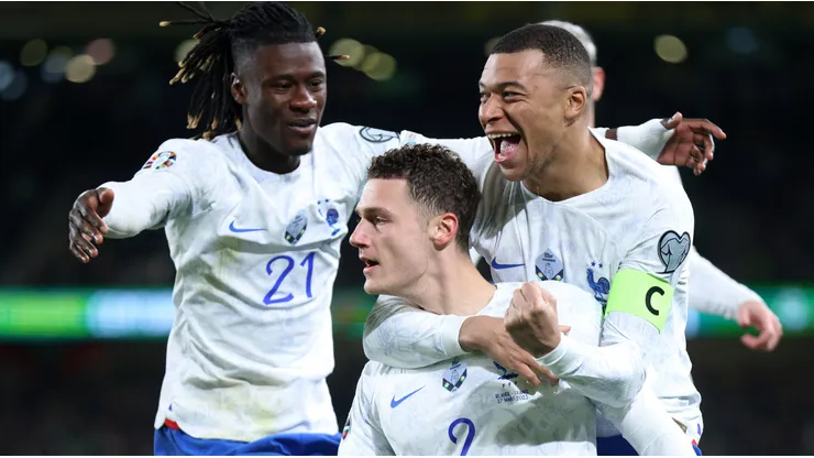 Eduardo Camavinga, Benjamin Pavard, and Kylian Mbappe of France