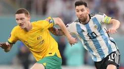 Kye Rowles of Australia and Lionel Messi of Argentina