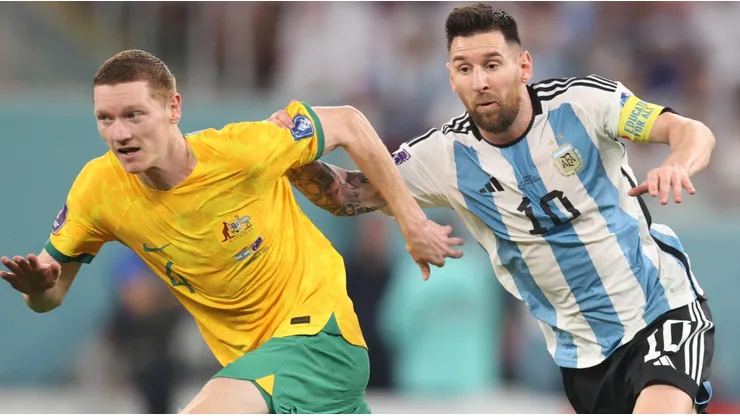 Kye Rowles of Australia and Lionel Messi of Argentina
