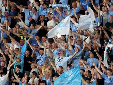 Why do Manchester City fans boo the UEFA Champions League anthem?