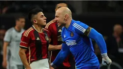 Thiago Almada #23 of Atlanta United reacts with goalkeeper Brad Guzan