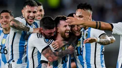Lionel Messi of Argentina and his teammates