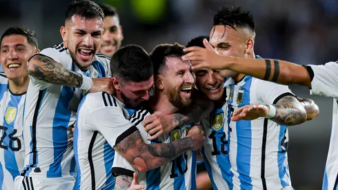 Lionel Messi of Argentina and his teammates
