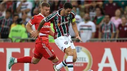 Lucas Beltrán of River Plate battles for possession with Nino of Fluminense