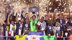 Marquinhos of Paris Saint-Germain, wearing a match shirt featuring the name of Sergio Rico and number 16, lifts the Ligue 1 Uber Eats trophy after the Ligue 1 match between Paris Saint-Germain and Clermont Foot at Parc des Princes on June 03, 2023 in Paris, France.