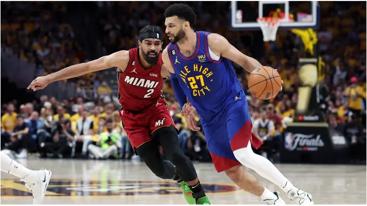 Jamal Murray #27 of the Denver Nuggets drives against Gabe Vincent #2 of the Miami Heat