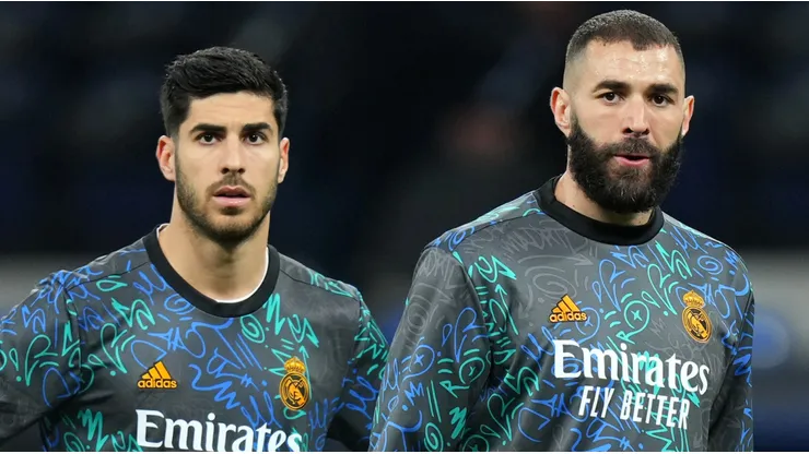 Marco Asensio and Karim Benzema of Real Madrid