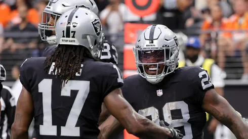 Davante Adams celebrates with Josh Jacobs - Las Vegas Raiders - NFL 2022