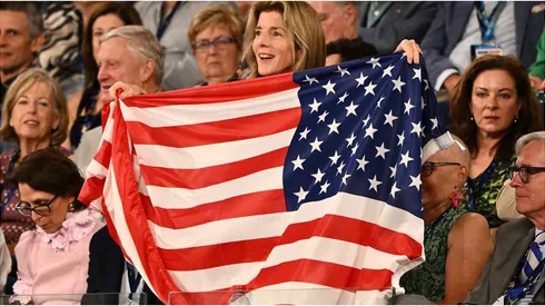 United States fan holds flag