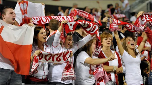 Polish fans cheer on their team