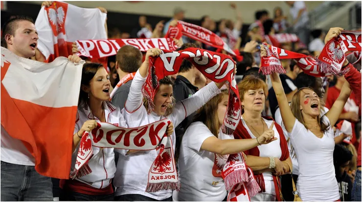 Polish fans cheer on their team