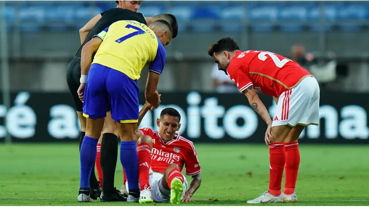 Cristiano Ronaldo of Al Nassr helps former teammate Angel Di Maria of SL Benfica