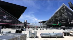 Workers construct additional seating at DRV PINK stadium ahead of Lionel Messi’s unveiling