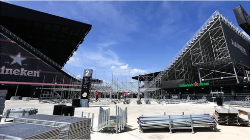 Workers construct additional seating at DRV PINK stadium ahead of Lionel Messi’s unveiling