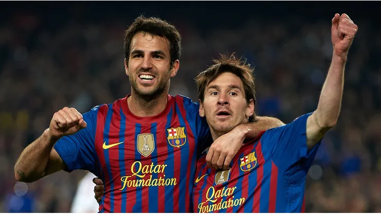 Lionel Messi with Cesc Fabregas playing for Barcelona