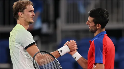 Alexander Zverev of Germany shakes hands with Novak Djokovic of Serbia