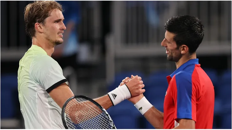 Alexander Zverev of Germany shakes hands with Novak Djokovic of Serbia