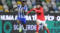 Zaidu Sanusi of FC Porto battles for possession with Rafa Silva of SL Benfica