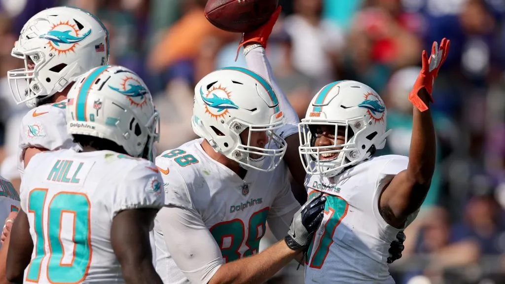 BALTIMORE, MARYLAND – SEPTEMBER 18: Jaylen Waddle #17 of the Miami Dolphins celebrates with teammates after a touchdown in the fourth quarter against the Baltimore Ravens at M&T Bank Stadium on September 18, 2022 in Baltimore, Maryland. (Photo by Patrick Smith/Getty Images)