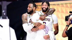 LeBron James and Anthony Davis celebrate after a game.