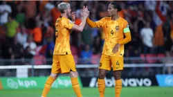 Wout Weghorst of Netherlands celebrates with teammate Virgil van Dijk