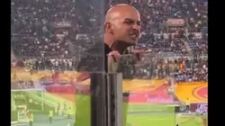AC Milan fan yelling at Roma supporters.