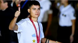 Paulo Dybala greets the fans during the arrival of the Argentina men's national soccer team