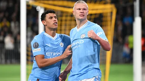 Erling Haaland of Manchester City celebrates with teammate Matheus Nunes