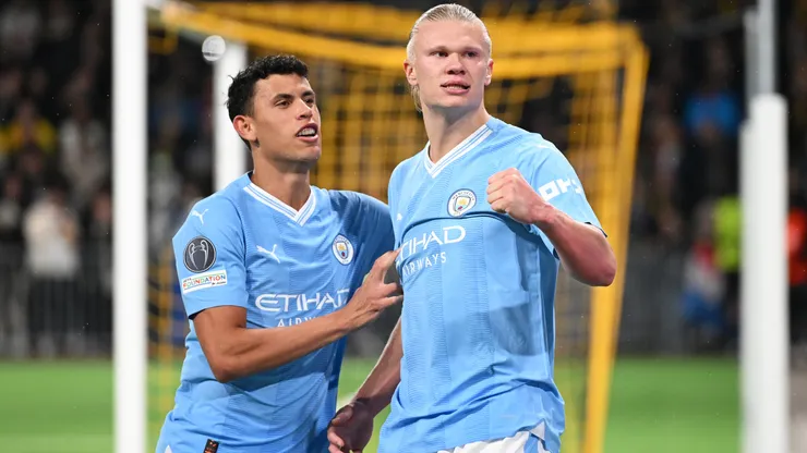 Erling Haaland of Manchester City celebrates with teammate Matheus Nunes