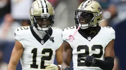 Rashid Shaheed #22 of the New Orleans Saints celebrates with Chris Olave