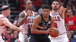 Giannis Antetokounmpo #34 of the Milwaukee Bucks looks to move against (L-R) Alex Caruso #6, DeMar DeRozan #11 and Nikola Vucevic #9 of the Chicago Bulls