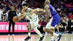 Jayson Tatum #0 of the Boston Celtics drives to the basket against P.J. Tucker #17 of the Philadelphia 76ers